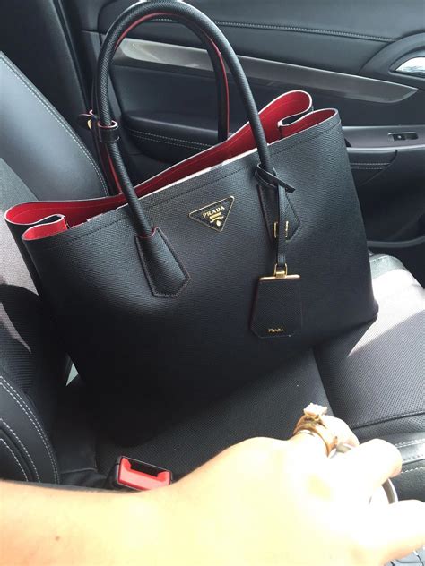 black prada bag with red inside|Prada shoulder bag price.